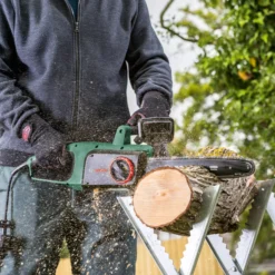 Bosch UniversalChain35 1.8W Mains Fed Corded 350mm Chainsaw -Outdoor Garden Shop bosch universalchain35 1 8w mains fed corded 350mm chainsaw4059952608167 06i bq